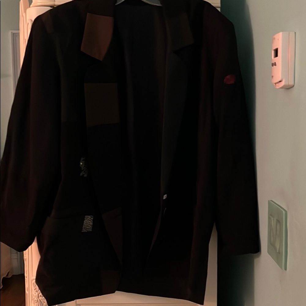 Oversized vintage blazer with shoulder pads.